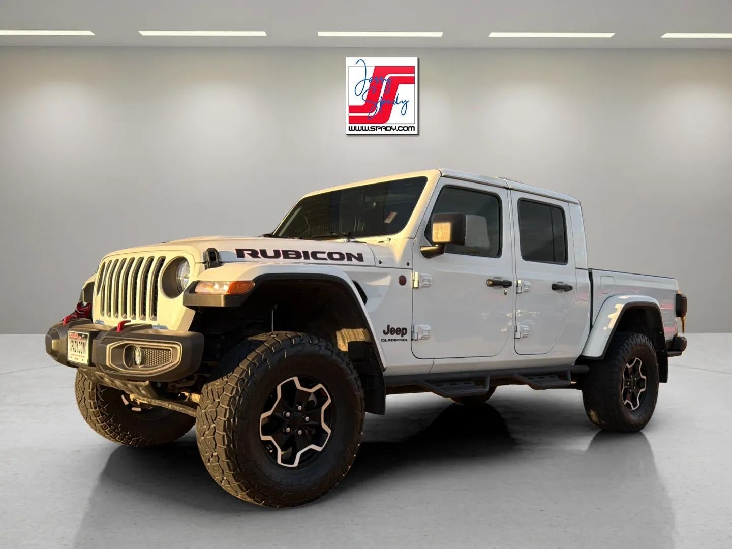 2021 Jeep Gladiator Rubicon in White — front three-quarter view