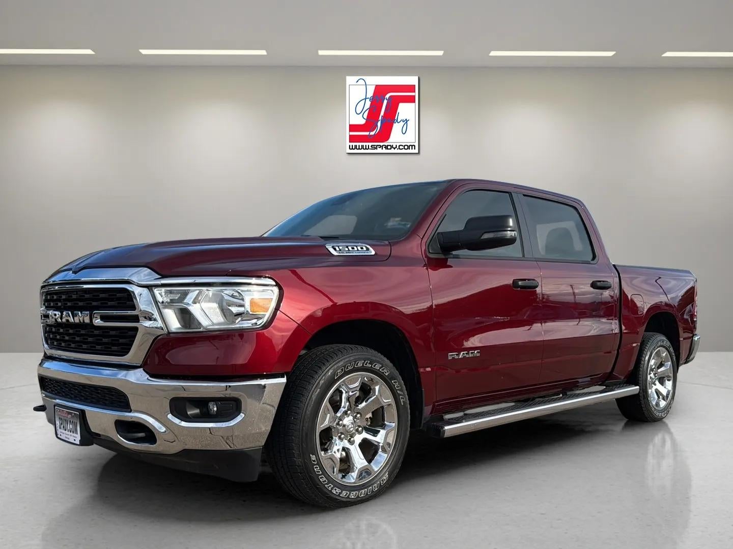 2024 RAM 1500 Big Horn in Red — front three-quarter view