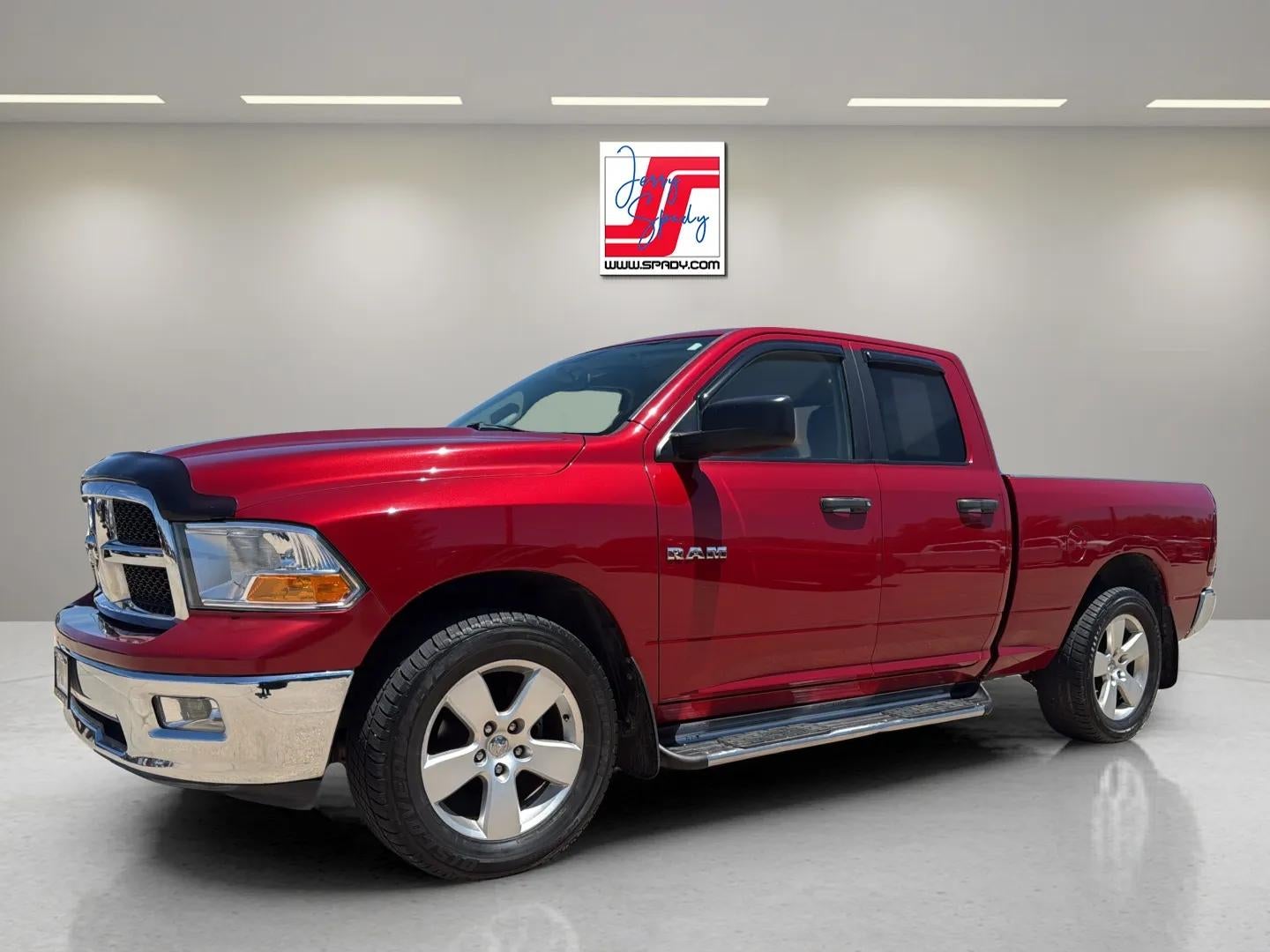 2009 Dodge Ram 1500 SLT in Red — front three-quarter view