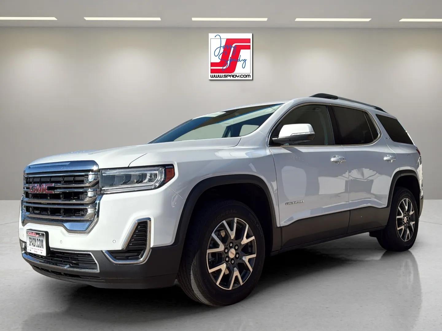 2023 GMC Acadia SLE in Summit White — front three-quarter view