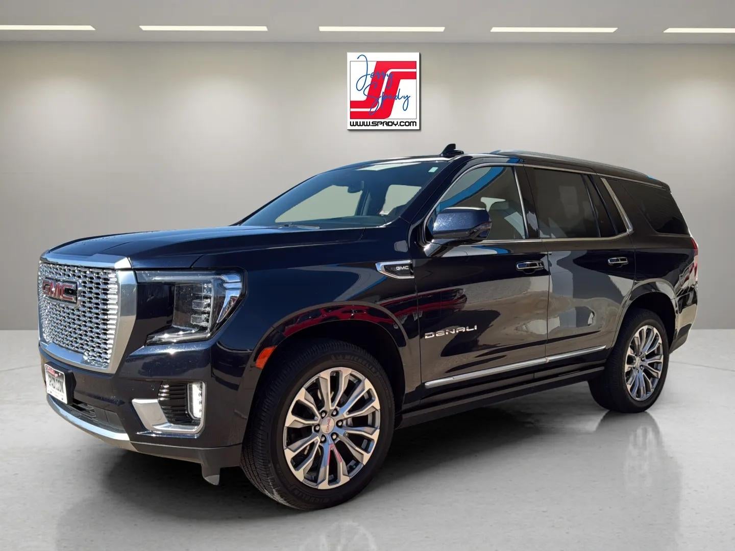2023 GMC Yukon Denali in Midnight Blue Metallic — front three-quarter view