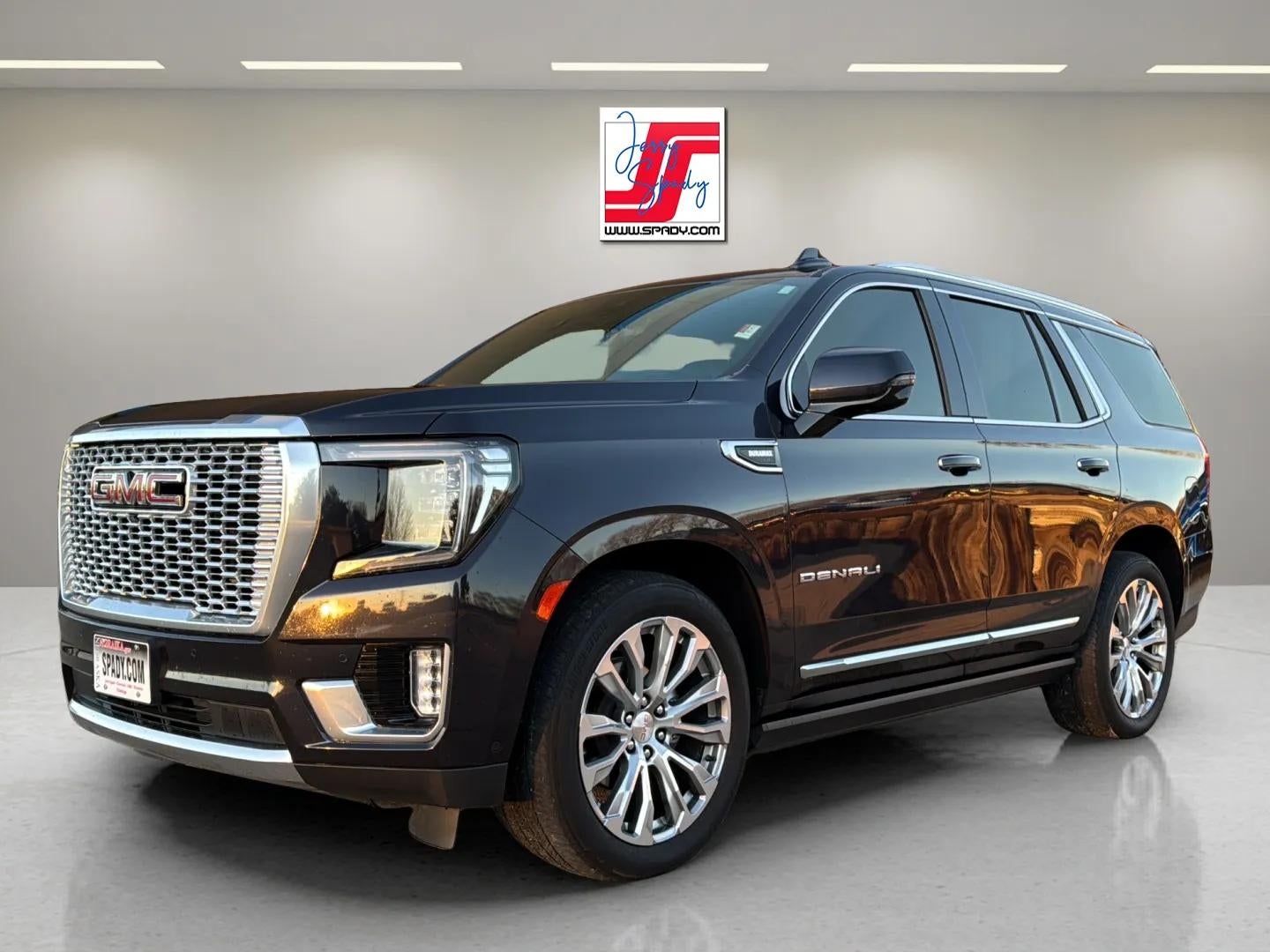 2023 GMC Yukon Denali in Titanium Rush Metallic — front three-quarter view