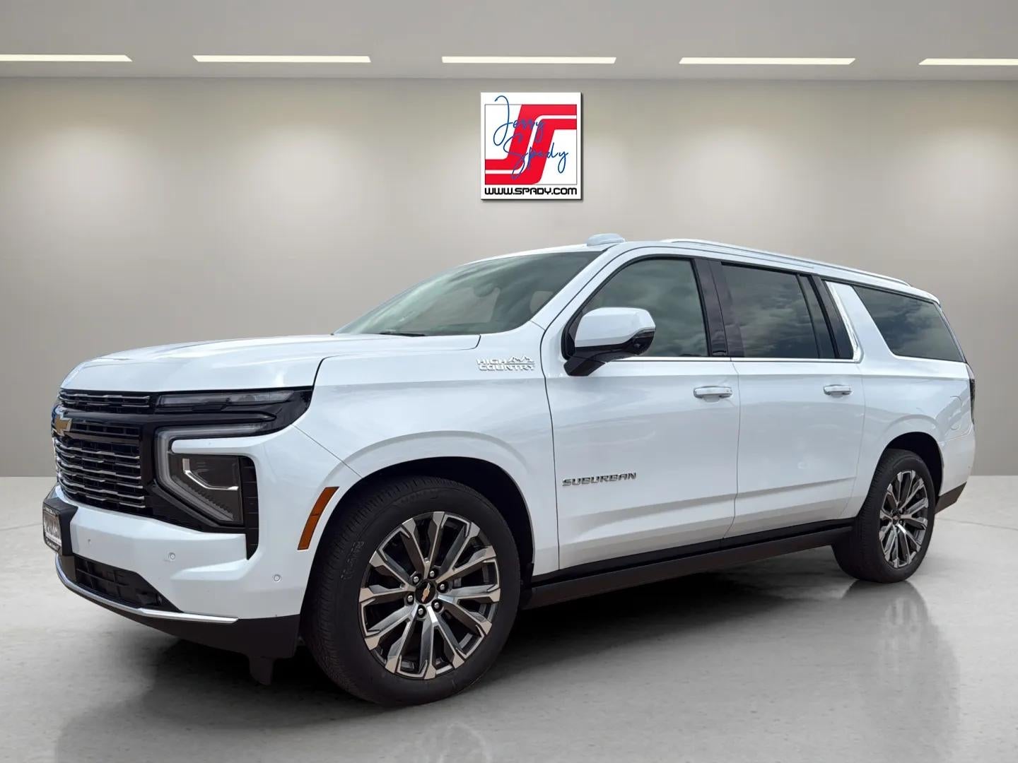 2026 Chevrolet Suburban High Country in Polar White Tricoat — front three-quarter view