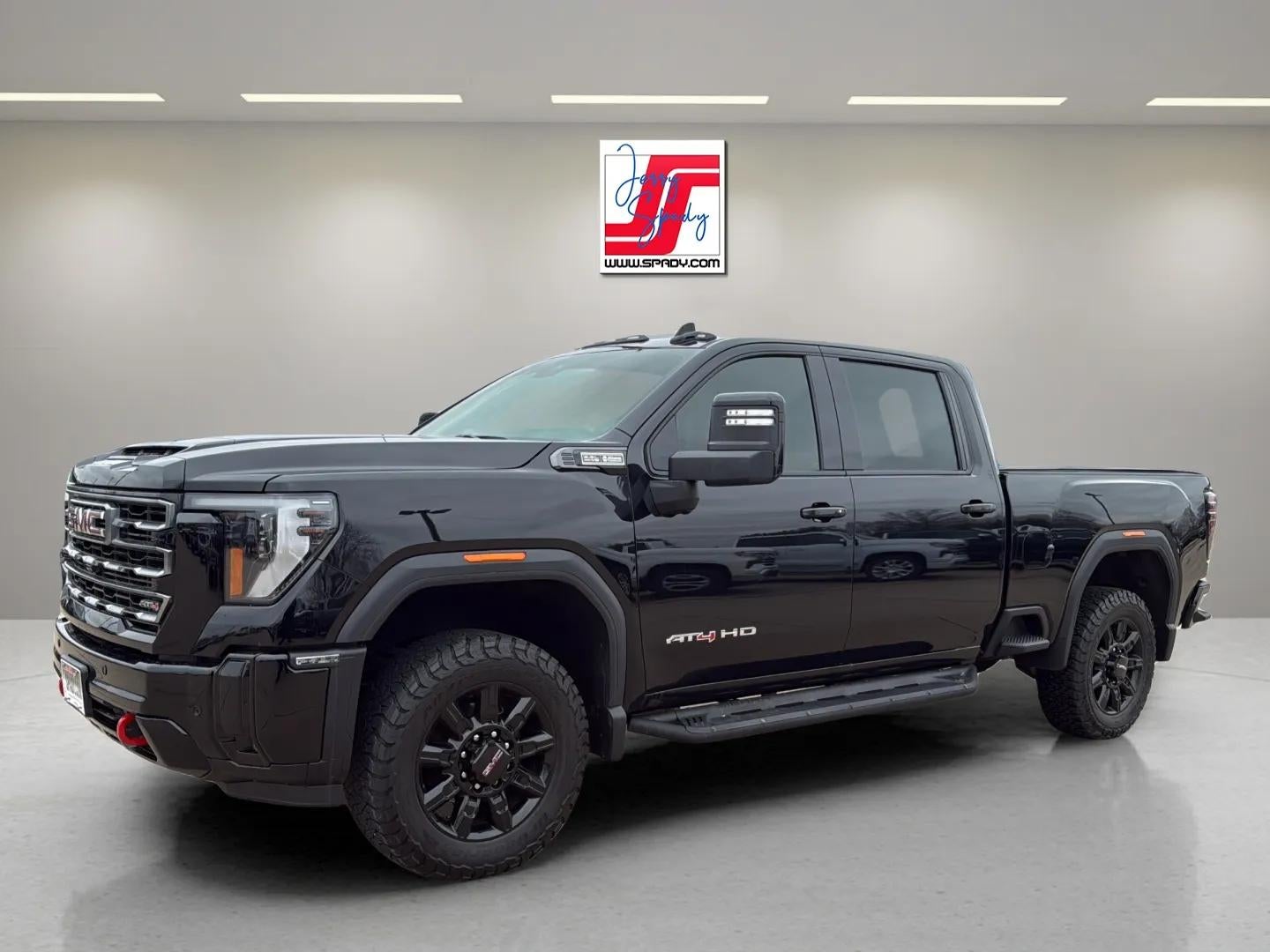 2025 GMC Sierra 2500 HD AT4 in Onyx Black — front three-quarter view