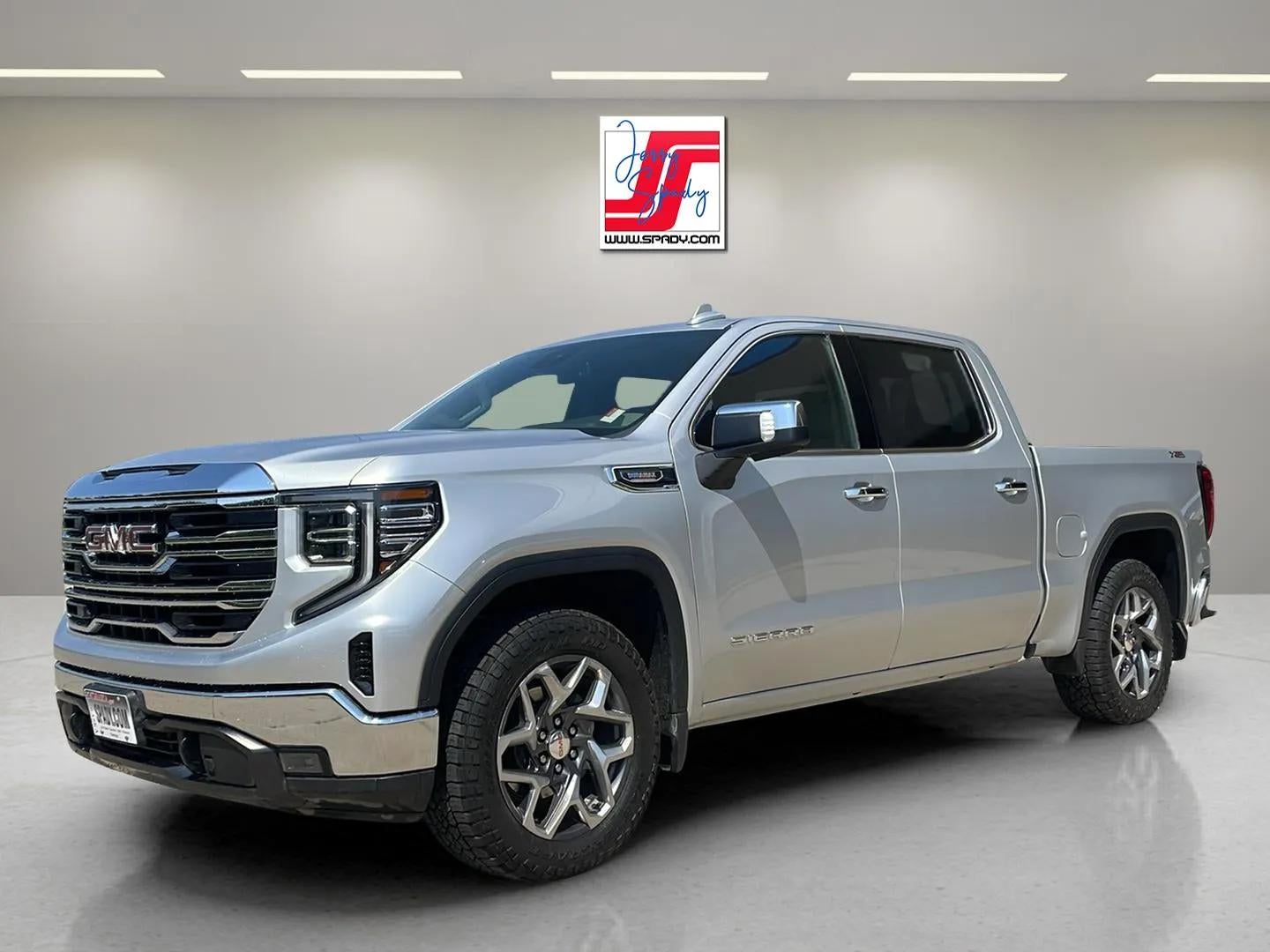 2022 GMC Sierra 1500 SLT in Quicksilver Metallic — front three-quarter view