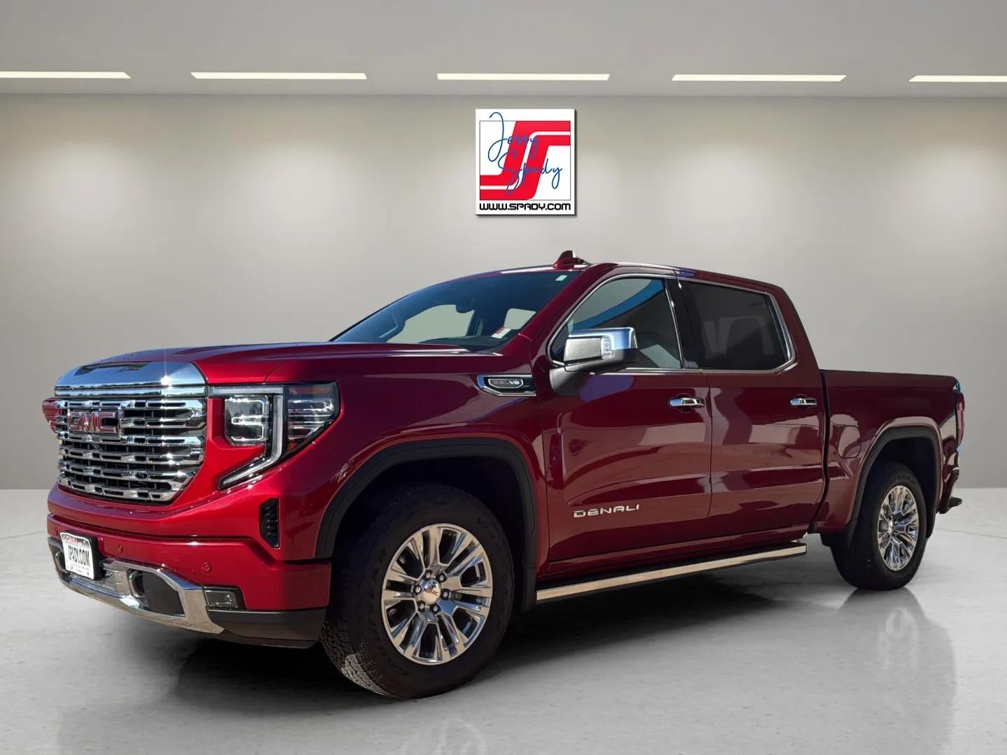 2024 GMC Sierra 1500 Denali in Volcanic Red Tintcoat — front three-quarter view