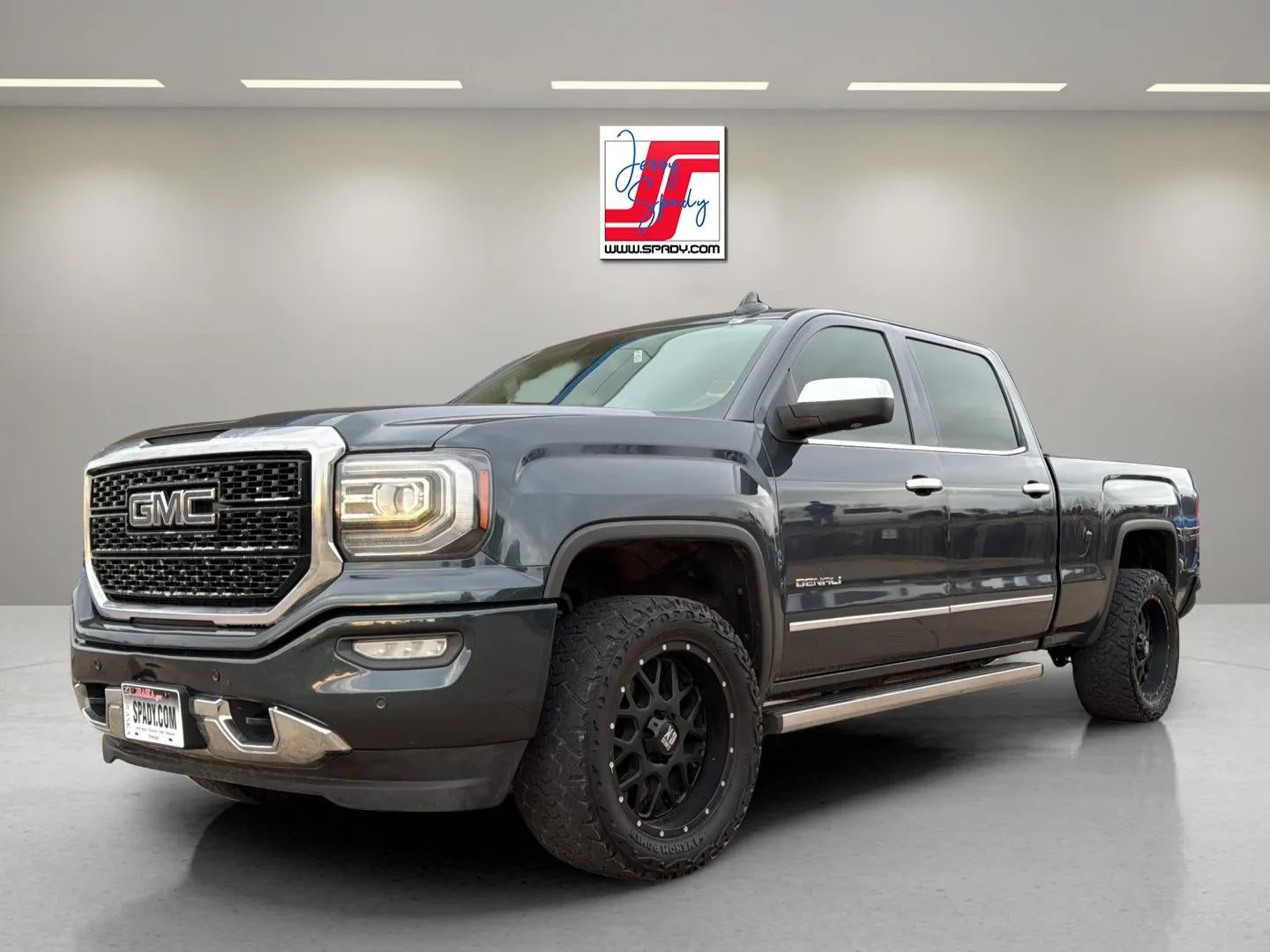 2017 GMC Sierra 1500 Denali in Dark Slate Metallic — front three-quarter view