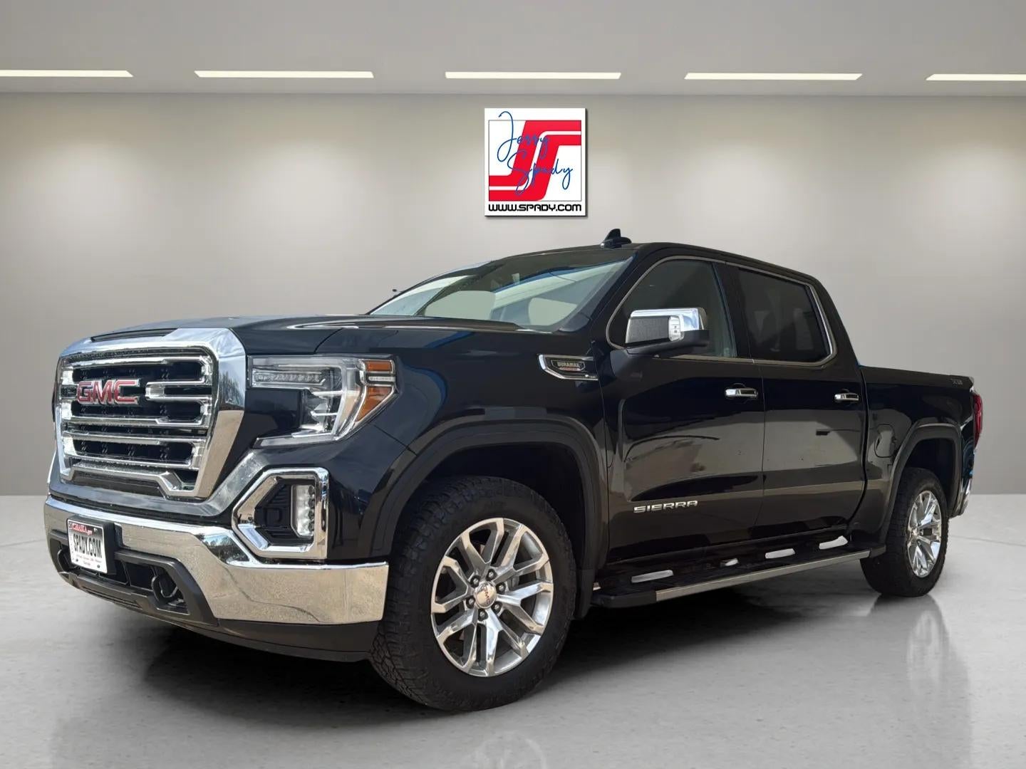 2021 GMC Sierra 1500 SLT in Ebony Twilight Metallic — front three-quarter view
