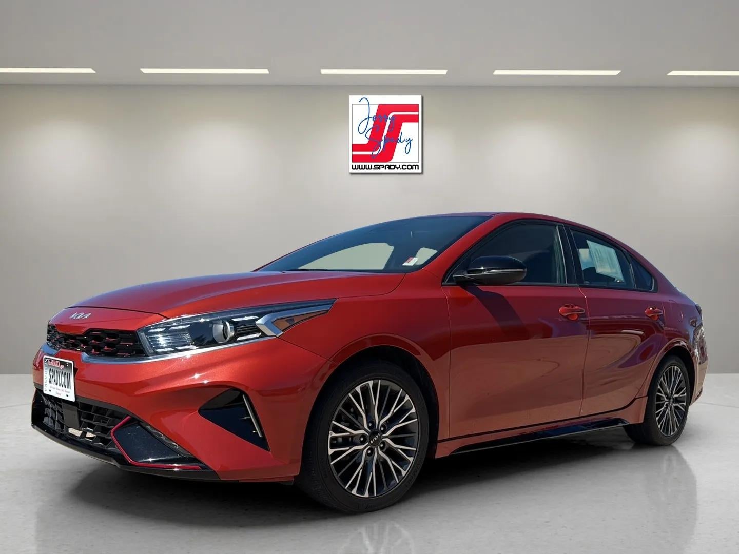 2023 Kia Forte GT-Line in Orange — front three-quarter view