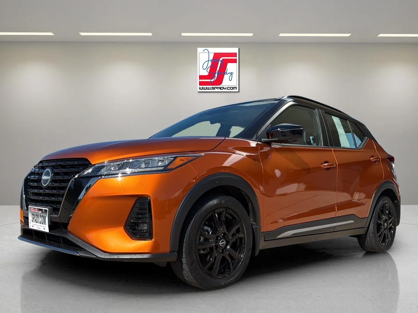 2023 Nissan Kicks SR in Orange — front three-quarter view
